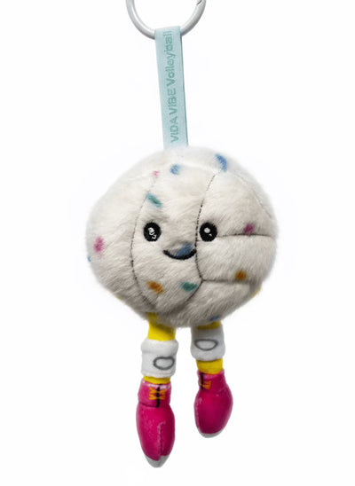 Plush volleyball toy with a face and colorful accents on a gray background